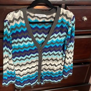 Perforated, chevron-patterned grays/blues/creams cardigan.